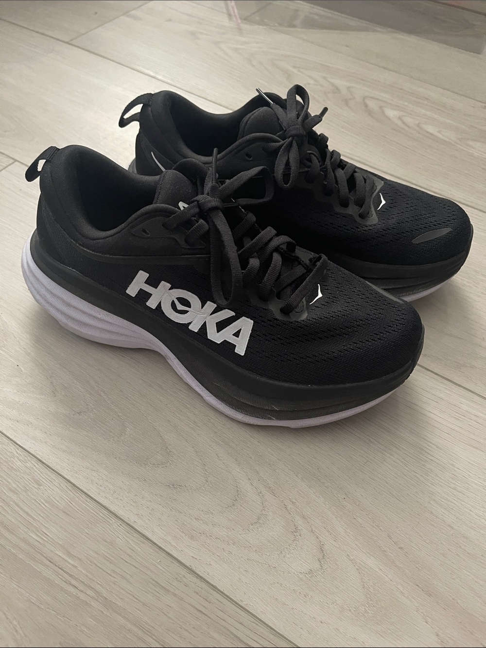 Hoka Black and White Running Sneakers